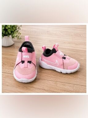 Nike Pink Toddler Slip-On Athletic Sneakers with White Swoosh